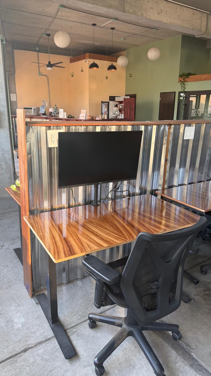 32" monitor on a sit-stand desk